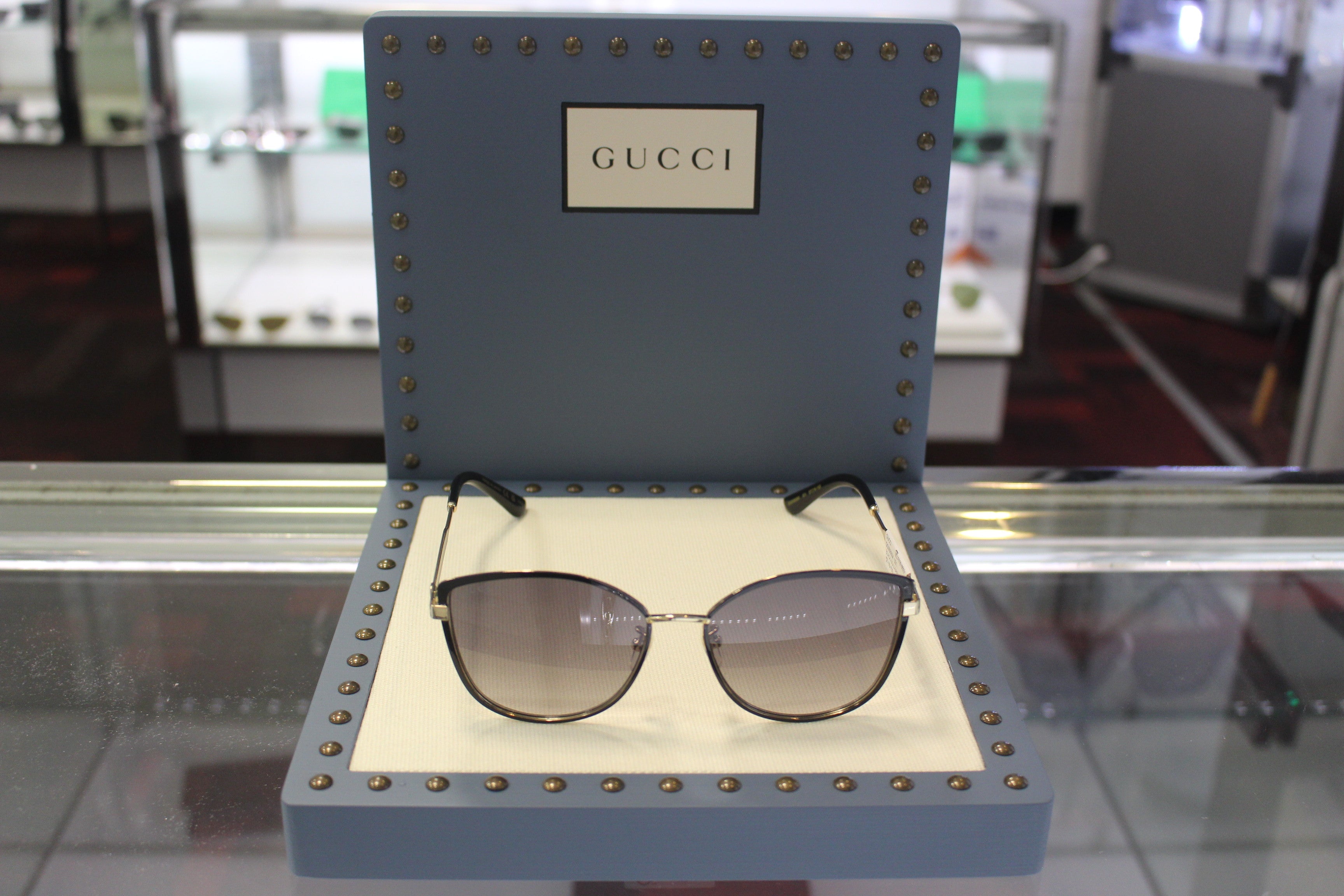 Gucci GG0589SK-001 57 Women’s Sunglasses | Black/Gold Metal Frame | Authentic Luxury